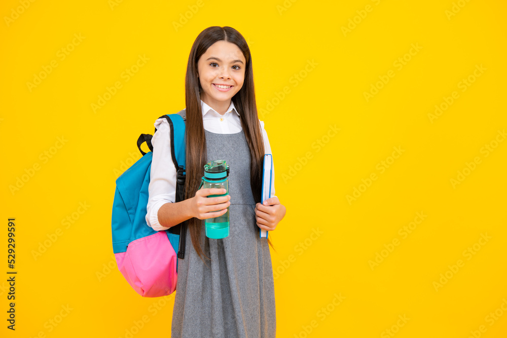 Teenager school girl with backpack holding water bottle. Teenager school girl with backpack holding water bottle.