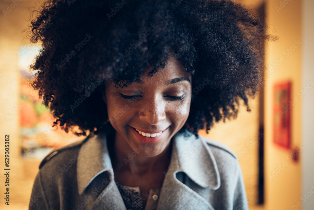 Cheerful businesswoman in hotel