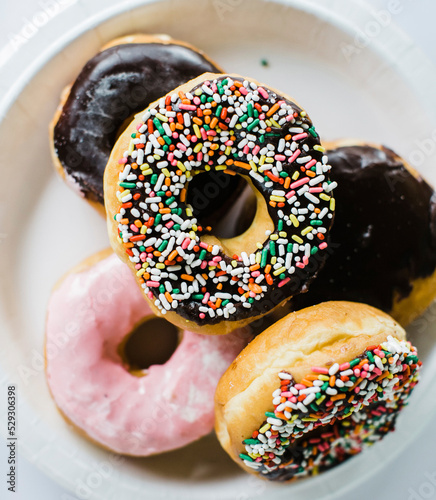 Close-up of donuts served in plate photo