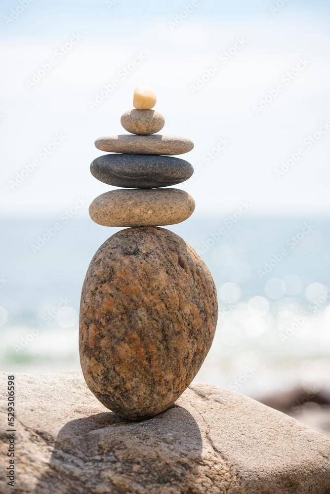 Stacked rocks against sea Stacked rocks against sea