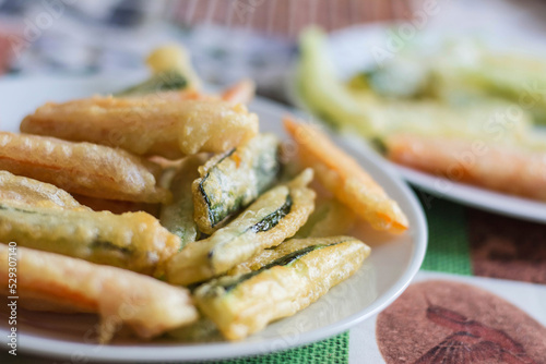 High angle close-up of vegetable tempura served in plate on table