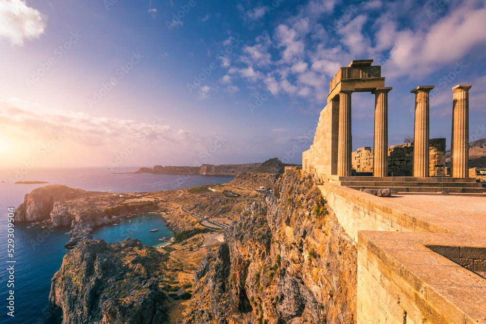 Aerial view on St. Paul's bay in Lindos, Rhodes island, Greece. Panoramic shot overlooking St Pauls Bay at Lindos on the Island of Rhodes, Greece, Europe. - obrazy, fototapety, plakaty 