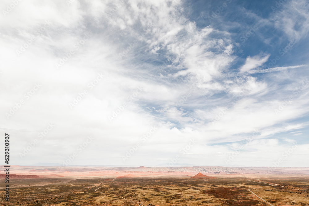 Aerial view of desert against cloudy sky Aerial view of desert against cloudy sky