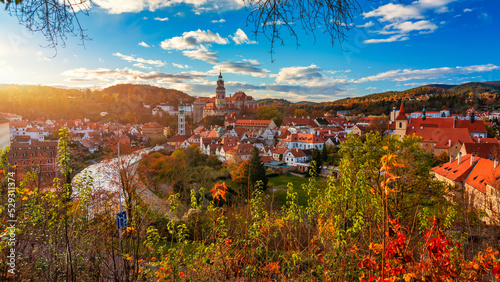 View of historical centre of Cesky Krumlov town on Vltava riverbank on autumn day overlooking medieval Castle, Czech Republic. View of old town of Cesky Krumlov, South Bohemia, Czech Republic.