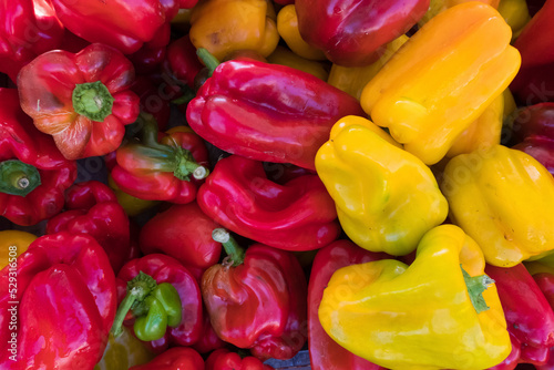 High angle view of bell peppers for sale at market photo