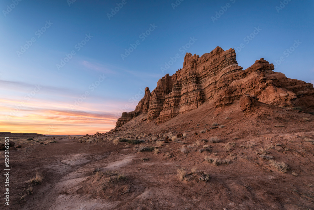 Low angle view of rock formations against blue sky during sunset at Canyonlands National Park
