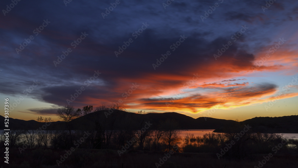 Twilight sky over Bouquet Reservoir in Los Angeles County, Southern California, United States.