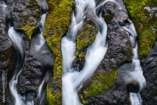 High angle view of river flowing on rocks at Iceland photo