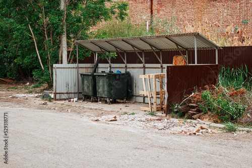 Garbage collection site. Two trash dumpsters © mettus