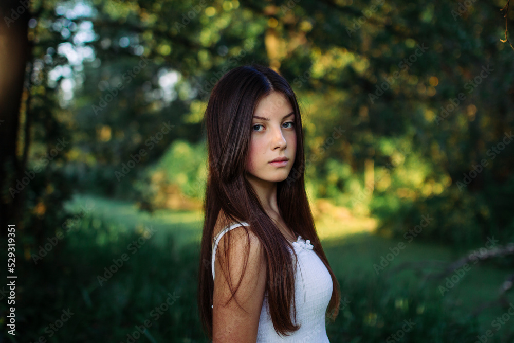 portrait of a brunette woman in the forest portrait of a brunette woman in the forest