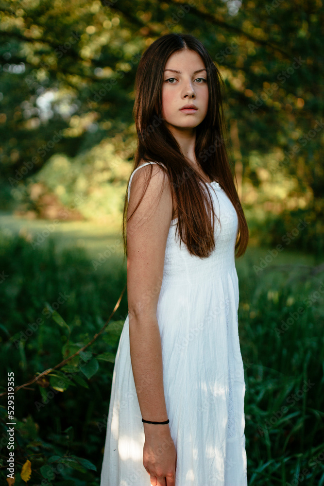portrait of a brunette woman in the forest portrait of a brunette woman in the forest