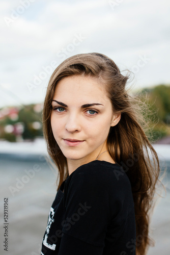 large portrait of a woman on the roof photo