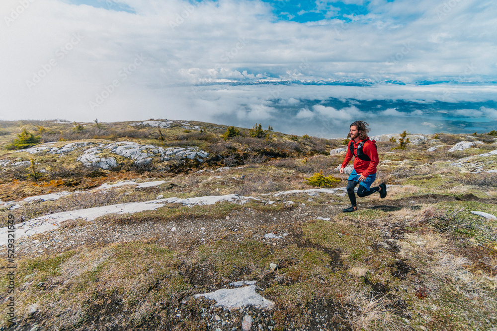 Man Running Single Track in Yukon Man Running Single Track in Yukon