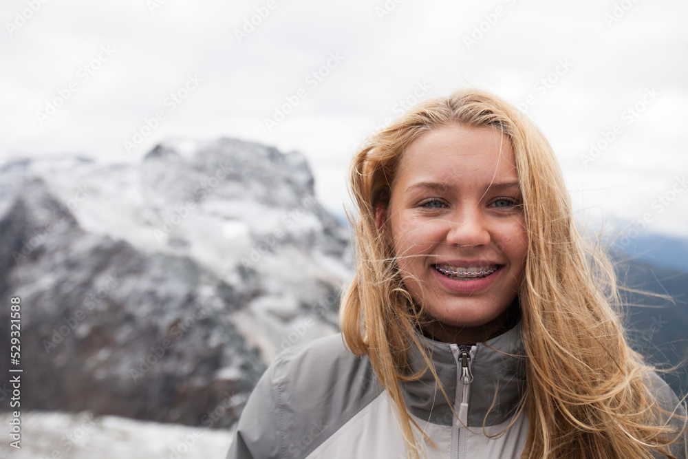 Portrait of young woman smiling outdoors Portrait of young woman smiling outdoors