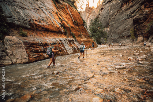 Girls in The narrows trail in Zion National Park photo