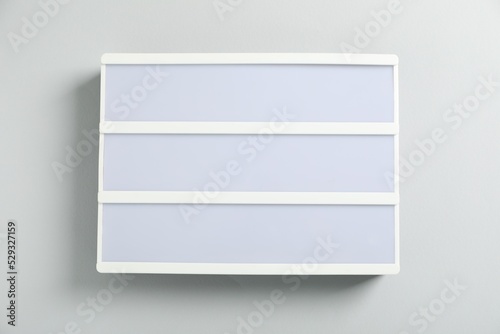 Blank letter board on white background, top view photo