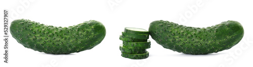 Set with whole and cut ripe cucumbers on white background. Banner design