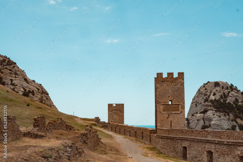 An old fortress against the blue sky. An old fortress against the blue sky.