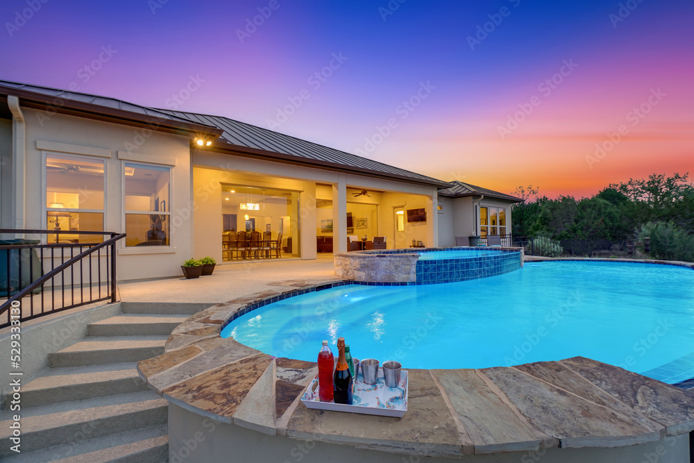 a luxury pool at sunset