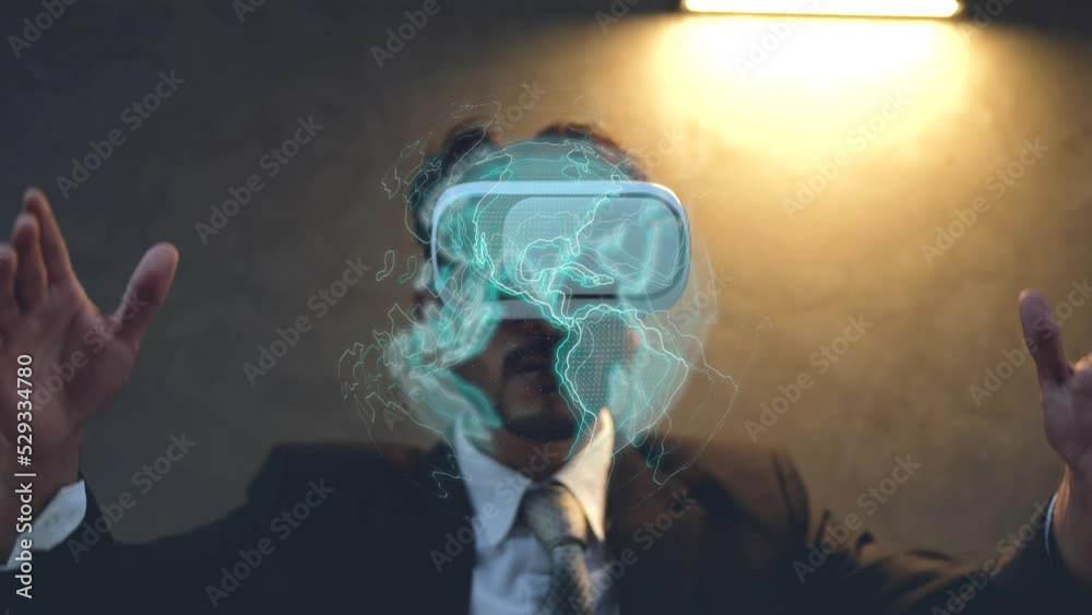 Vidéo Stock Businessman wearing and using VR virtual reality goggle and ...