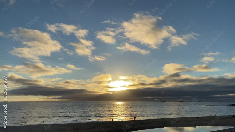 Sunset clouds Timelapse Dramatic sunset landscape with large building clouds Natural colorful sky Amazing for digital cinema composition background Beautiful light of nature timelapse. Over ocean. Sunset clouds Timelapse Dramatic sunset landscape with large building clouds Natural colorful sky Amazing for digital cinema composition background Beautiful light of nature timelapse. Over ocean.