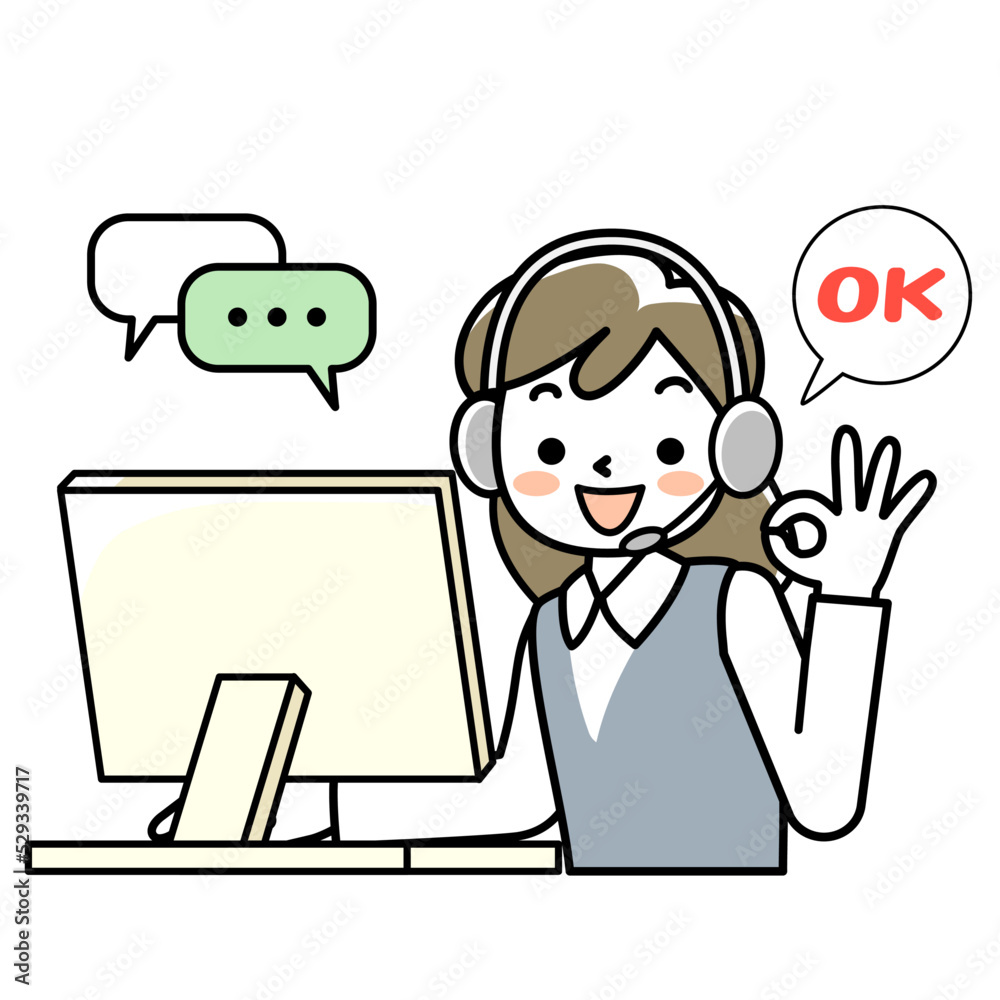 ヘッドセットをつけてパソコンに向かう若い女性 ヘッドセットをつけてパソコンに向かう若い女性