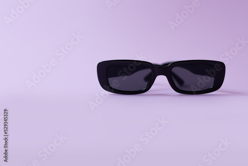 Sunglasses on violet background. Flat lay, minimalistic concept of summer, vacation.