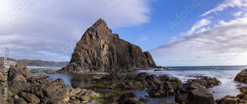 mid afternoon panorama looking east of lion rock at south cape bay in the wilderness of south west national park in tasmania, australia photo