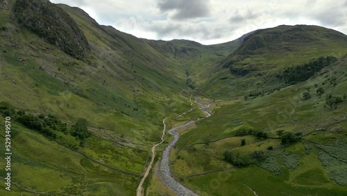 Drone Aerial footage of  Seathwaite a small hamlet in Borrowdale valley in the Lake District of Cumbria. United Kingdom. photo