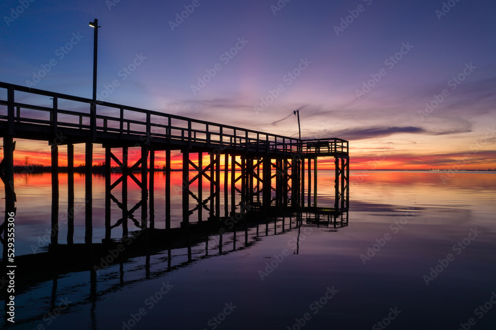 Pier on Mobile Bay at sunset in Daphne, Alabama Pier on Mobile Bay at sunset in Daphne, Alabama