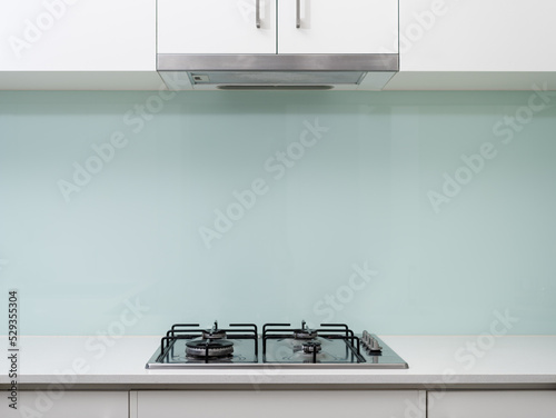 Clean gas stove cooking top in modern kitchen.