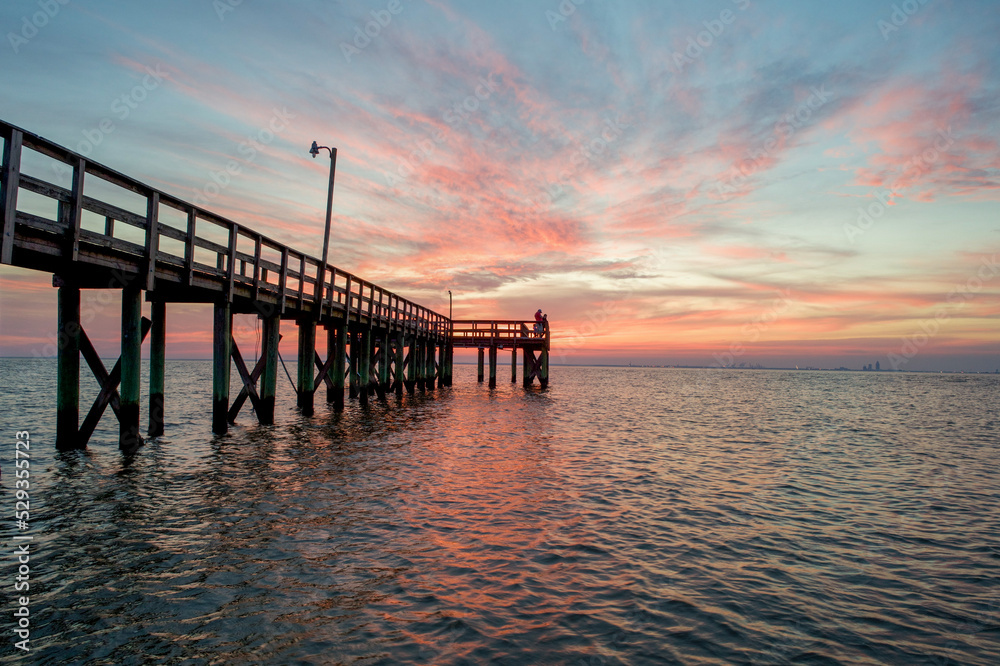 Fototapeta premium Pier on Mobile Bay at sunset in Daphne, Alabama