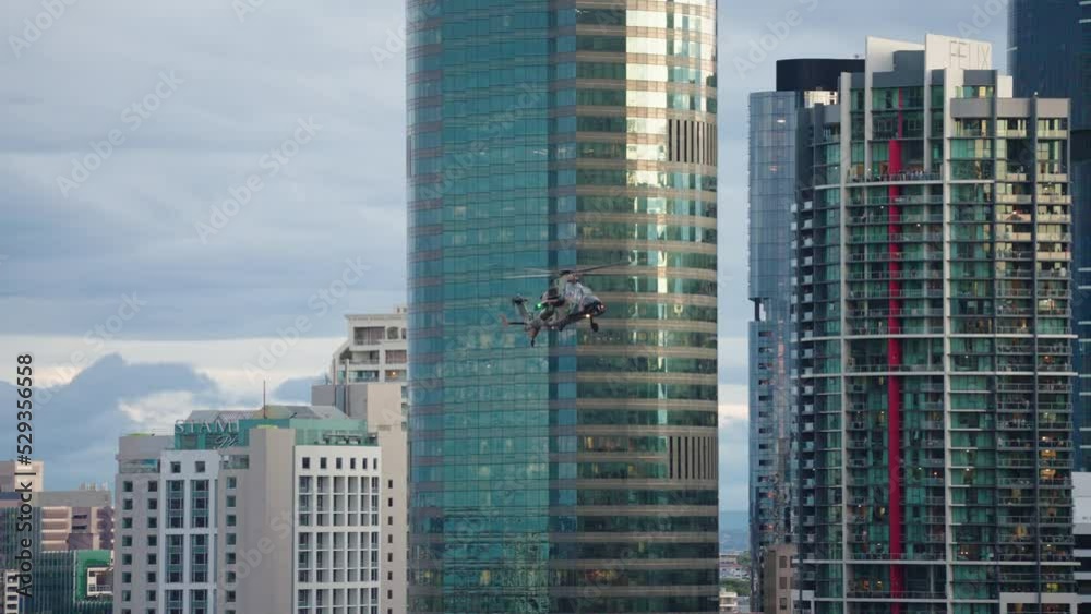 Military AIrcraft Helicopter Makes Sharp Turn Maneuver Near Skyscraper Buildings In Brisbane City During Riverfire, 4K Slow Motion Military AIrcraft Helicopter Makes Sharp Turn Maneuver Near Skyscraper Buildings In Brisbane City During Riverfire, 4K Slow Motion