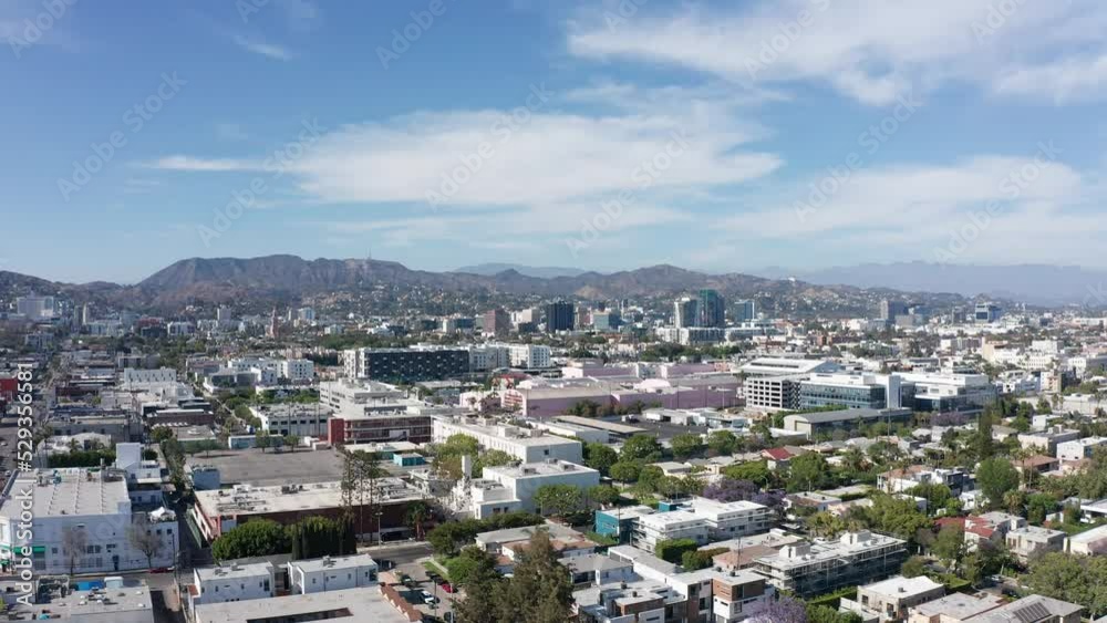 Rising aerial dolly shot of Hollywood from Highland Ave. and Melrose Ave.. 4K Rising aerial dolly shot of Hollywood from Highland Ave. and Melrose Ave.. 4K