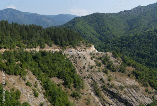 Rhodopes, are a mountain range in Southeastern Europe. Bulgaria. Panorama. The forest area covers the mountains. © Piotr
