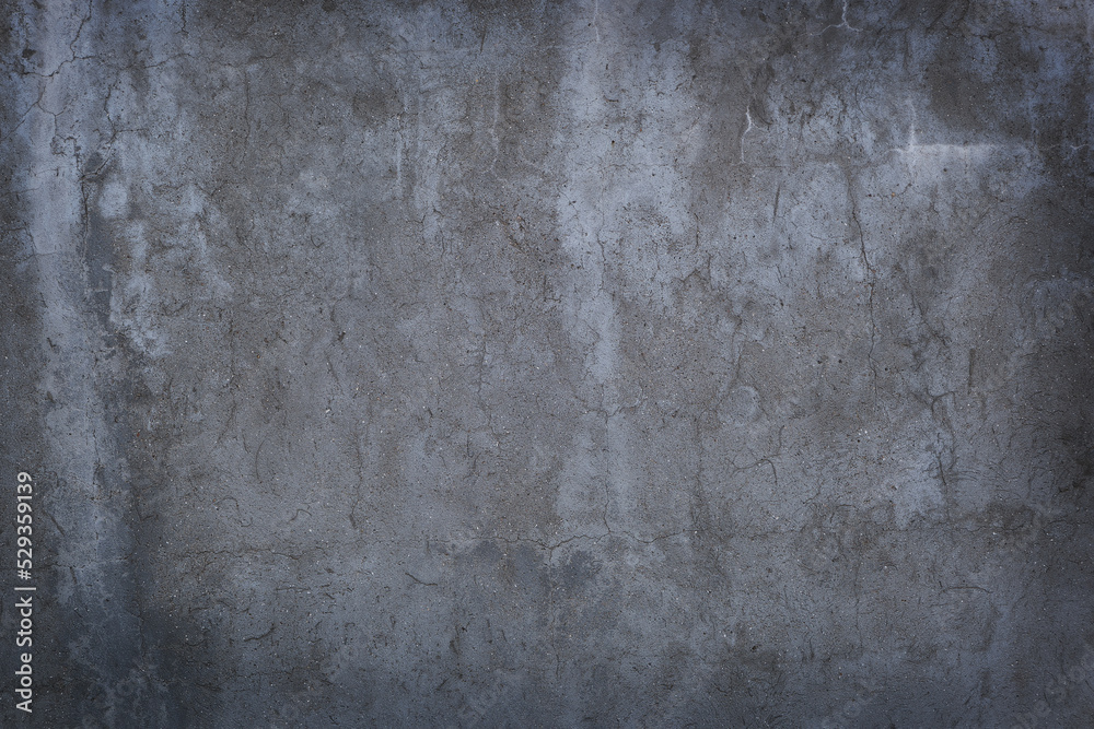 Texture of concrete with small cracks and vignetting.
