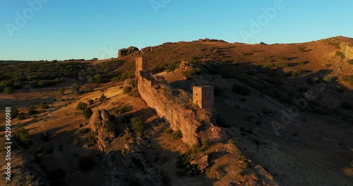 View Of Zafra Castle In Spain At Sunset With Blue Sky - aerial drone shot - Game of Thrones location photo