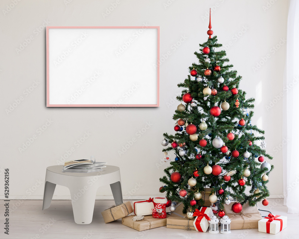 Chirstmas Interior Kids Wall Frame Mockup Template with Christmas Tree and Christmas gift boxes 
