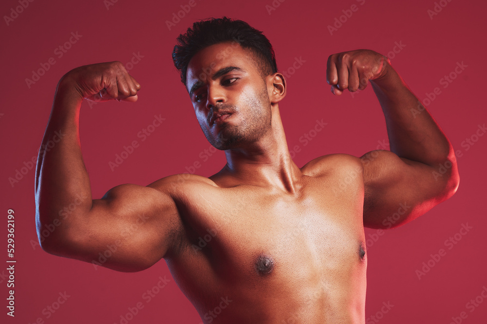 Fitness health, strong muscles and sports man with healthy body against red mockup studio background. Mock up of thinking, sport and Indian professional bodybuilder and weightlifter flexing muscle