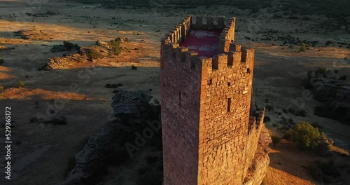 Castle Of Zafra At Sunset In Guadalajara, Spain. Game Of Thrones Film Location. aerial orbit photo