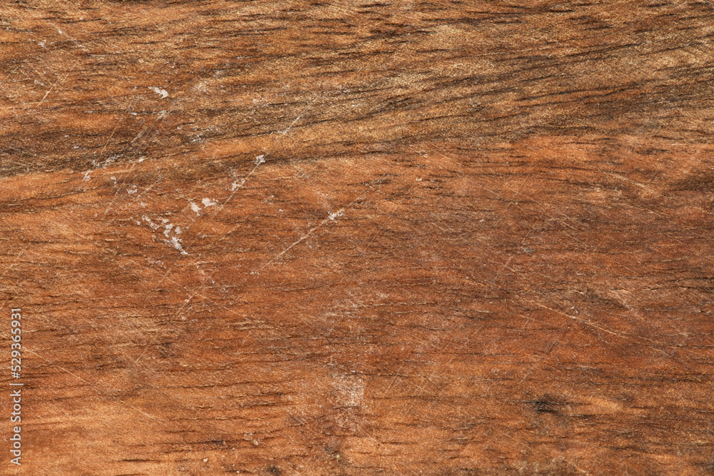 old wooden board weathered and scratched for texture or background old wooden board weathered and scratched for texture or background