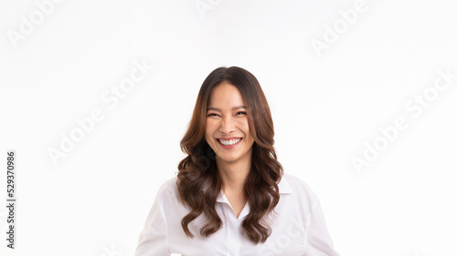 Asian woman, professional entrepreneur standing in white shirt, smiling and looking confident, isolated on white background.
