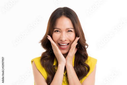 Beautiful smiling, long hair Asian woman in green shirt, poses in a very happy feeling, surprised, excited and surprised, isolated on white background.