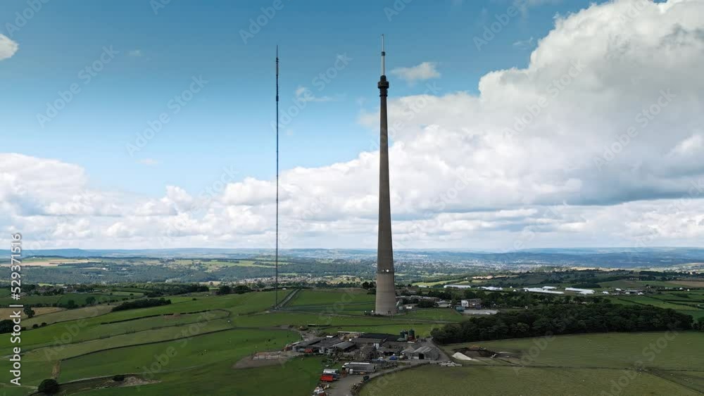 Emley Moor transmitting station, is a telecommunications and broadcasting. The station's iconic concrete tower is 1 is a Grade II listed. It is the tallest freestanding structure in the UK Emley Moor transmitting station, is a telecommunications and broadcasting. The station's iconic concrete tower is 1 is a Grade II listed. It is the tallest freestanding structure in the UK