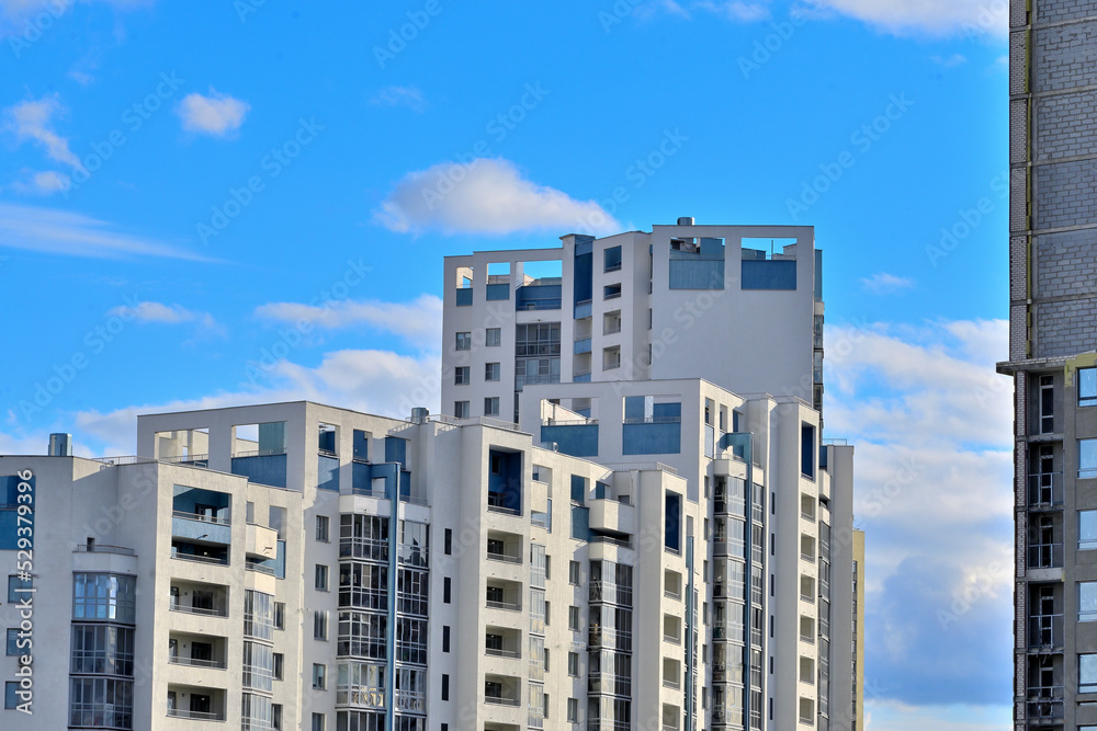 Multi-storey residential building on an autumn day