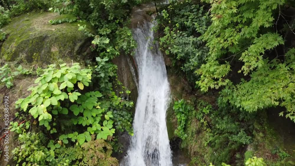 waterfall naturally falling down in the jungle waterfall naturally falling down in the jungle