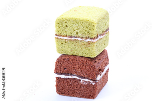 Brownie cheese cake and green tea cake on white background