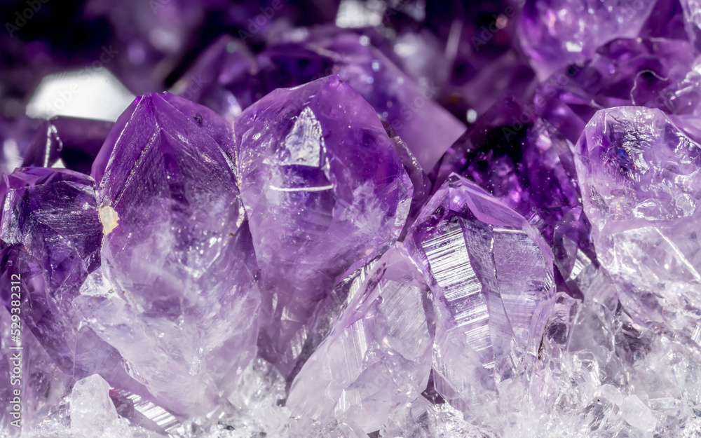 Amethyst purple crystals. Gems. Mineral crystals in the natural ...