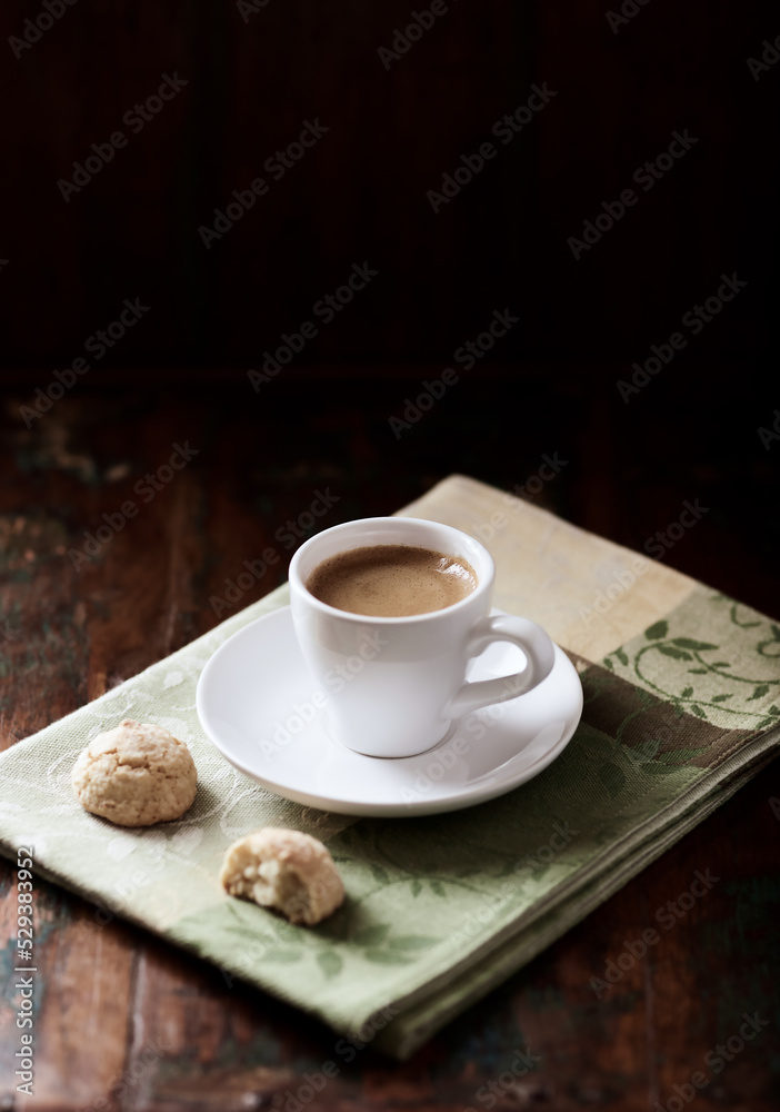 Cup of coffee on dark wooden background. Soft focus. Copy space. Cup of coffee on dark wooden background. Soft focus. Copy space.