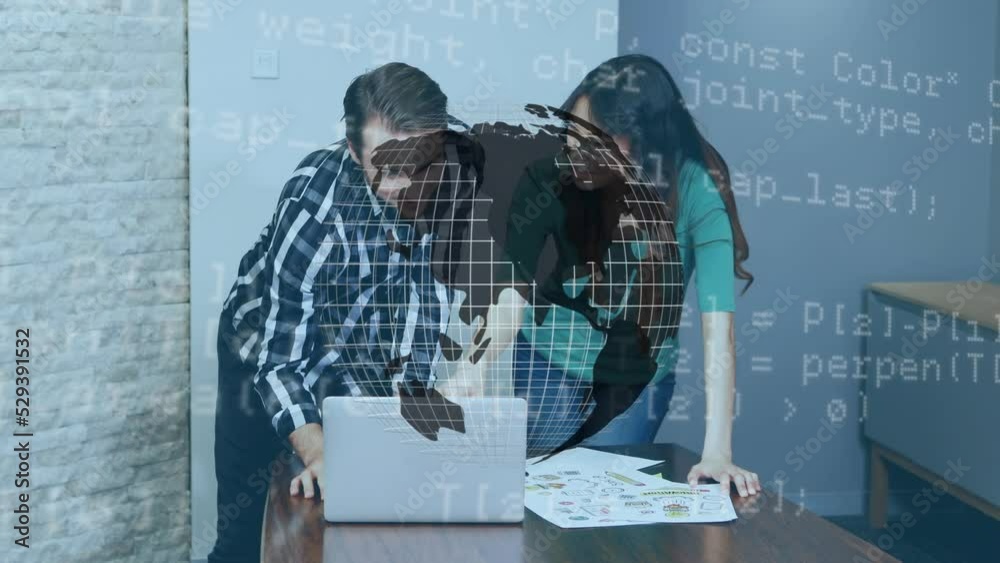 Animation of data processing over diverse male and female colleagues using laptop at office Animation of data processing over diverse male and female colleagues using laptop at office